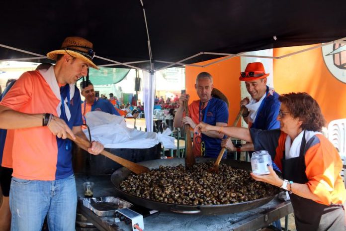 People cooking snails at LLeida's Aplec del Caragol 2024 / Alba Mor People cooking snails at LLeida's Aplec del Caragol 2024 / Alba Mor